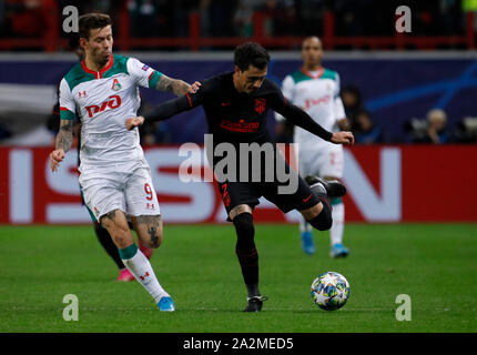 MOSCOW, RUSSIA - OCTOBER 01: Fyodor Smolov (L) of Lokomotiv Moskva and Jose Gimenez of Atletico Madrid vie for the ball during the UEFA Champions League group D match between Lokomotiv Moskva and Atletico Madrid at RZD Arena on October 1, 2019 in Moscow, Russia. (Photo by MB Media) Stock Photo