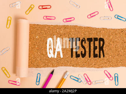 Handwriting text writing Qa Tester. Conceptual photo Quality assurance of an on going project before implementation Stock Photo