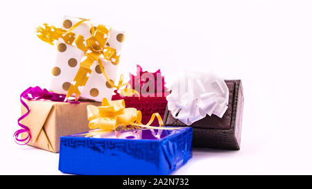 Set of colorful gift boxes with bows and ribbons on white background Stock Photo