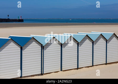 Beach huts on the beach at Dunkirk in northern France. Stock Photo