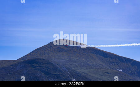 Newcastle Air Show, Red Arrow in front of Slieve Donard Stock Photo