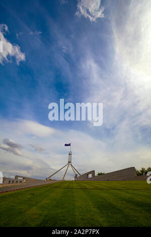 Grass roof of Parliament House, Canberra, Australia. The building was designed by Mitchell - Giurgola & Thorp Architects and built by a Concrete Const Stock Photo