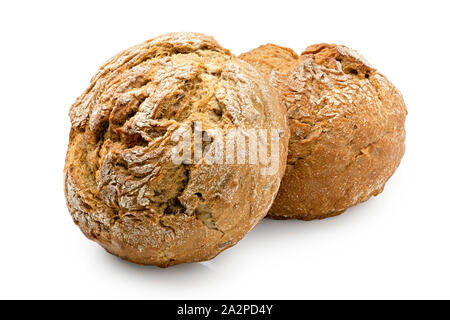 Two round rustic whole wheat bread rolls isolated on white. Stock Photo