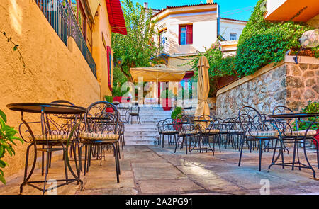 Charming street cafe in Plaka district in Athens, Greece Stock Photo