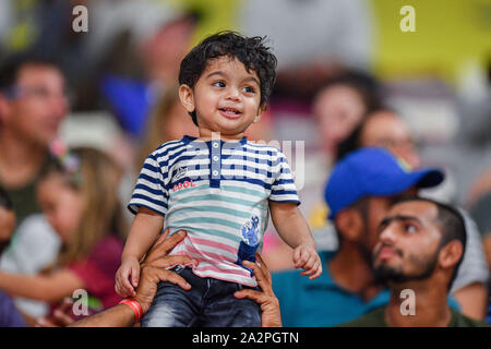 Doha, Qatar. 3rd Oct, 2019. A local child with the parents, looks excited during day 7 of the IAAF World Athletics Championships - Doha 2019 at Khalifa International Stadium on Thursday, October 03, 2019 in DOHA, QATAR. Credit: Taka G Wu/Alamy Live News Stock Photo