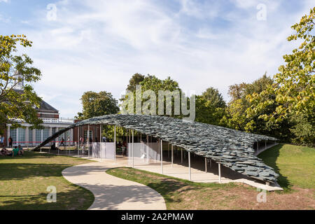 The Cumbrian Slate covered temporary summer pavilion; an installation designed by Japanese architect Junya Ishigami located in Kensington, west London Stock Photo