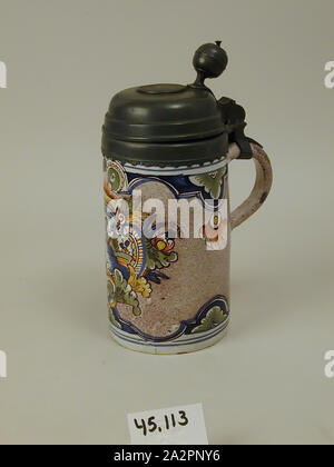 Mug with Pewter Lid, 18th Century, Tin-glazed earthenware, pewter, 10 x 6 1/2 x 4 3/8 in. (25.4 x 16.5 x 11.1 cm Stock Photo