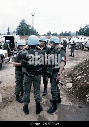3rd June 1993 During the Siege of Sarajevo: French soldiers serving with UNPROFOR in the car park at Sarajevo Airport. Stock Photo