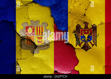 flags of Andorra and Moldova painted on cracked wall Stock Photo