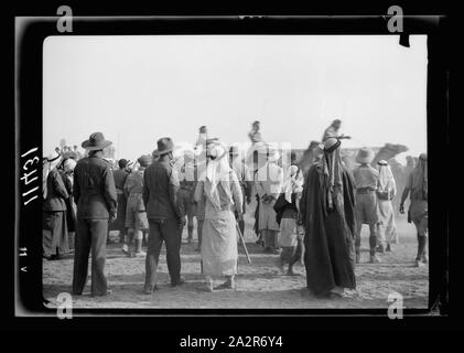 Race meeting (horse & camel). Beersheba. A camel race in full stride, the excited crowd eclipsing camels from camera Stock Photo