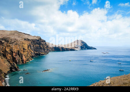 Amazing cliffs in Ponta de Sao Lourenco, the easternmost point of Madeira Island, Portugal. Cliffs by the Atlantic ocean. Portuguese volcanic landscape. Travel destination and tourist attraction. Stock Photo