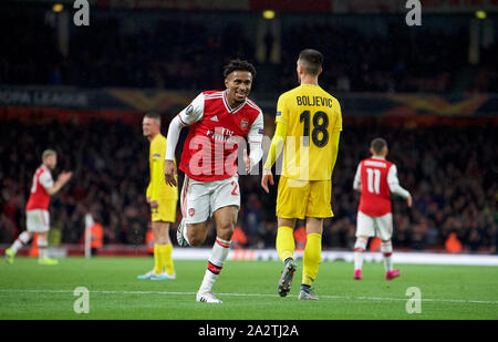 London, UK. 03rd Oct, 2019. Reiss Nelson of Arsenal runs to join 3rd goal celebrations during the UEFA Europa League match between Arsenal and Standard Liege at the Emirates Stadium, London, England on 3 October 2019. Photo by Andrew Aleks. Credit: PRiME Media Images/Alamy Live News