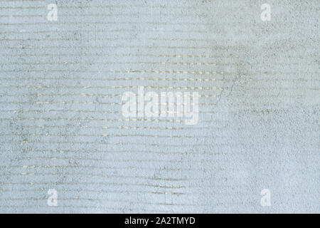 Texture of a plastered unpainted wall with a leveling mesh. Suitable background for the theme of construction, repair. Stock Photo