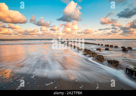 The beach near the dutch villages Westkapelle and Domburg on a warm summer morning. Stock Photo