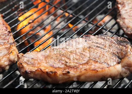 rump steaks on the grill Stock Photo