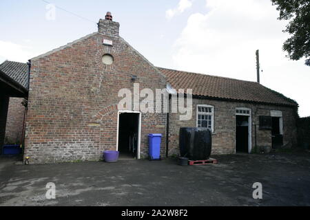 Old Brick Stables and Outbuildings on Rural Country Georgian Manor Estate Stock Photo