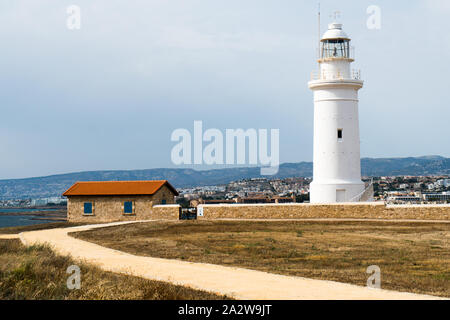 A coastal well known lighthouse inside of Paphos Archaeological Park on the island Cyprus, near town Paphos Stock Photo