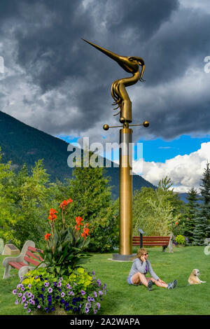 Garden, with heron weather vane sculpture, Lake Side Park, Nelson, British Columbia, Canada