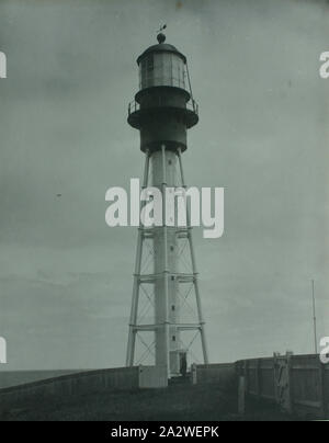 Photograph - Currie Harbour Lighthouse, King Island, 1887, One of thirty-two black and white photographs in an album [two are loose] taken by A J Campbell during a Field Naturalists' Club of Victoria expedition to King Island. The album also includes maps of King Island in the inside front cover and back page and numerous newspaper clippings relating to the expedition. One of the newspaper clippings, written by one of the members of the party Stock Photo