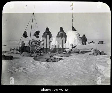Lantern Slide - British Imperial Antarctic Expedition, Adams, Wild, Shackleton at Campsite, Antarctica, Jan 1909, Photograph depicting members of the British Imperial Antarctic Expedition, Jameson Adams, Frank Wild and Ernest Shackleton, at a supply depot in Antarctica on January 1909. The image was taken by Eric Marshall on their return journey from their farthest south position of 88º23'S Stock Photo