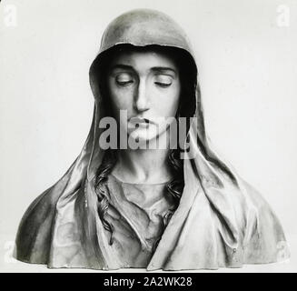 Lantern Slide - 'The Virgin of Sorrows', Victoria & Albert Museum, 1909-1930, One of a set of ninety photographic magic lantern slides containing images of artefacts, art works, decorative arts, interiors and furniture which appear to belong to various museum and gallery collections in the United Kingdom. This slide depicts an image of a sculpture of the Virgin of Sorrows made from painted pinewood with ivory and glass. This was made in Grenada circa 1680-1700 Stock Photo