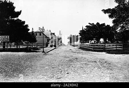 Negative - Manly, New South Wales, circa 1880, A street in Manly with the entrance to the Ivanhoe park hotel on the left There is a gaslight on the left Stock Photo
