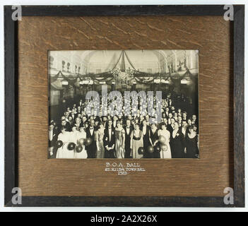 Photograph - Attendees at Bank Officials Association Ball, St Kilda Town Hall, Melbourne, 1923, Framed photograph of men and women at the Bank Officials Association (B.O.A) Ball, held at the St Kilda town hall in Melbourne, 1923. Banking unions began emerging after the First World War, in 1918. E.C. Peverill from the National Bank of Australasia in Victoria was instrumental in establishing the Bank Officials' Association in 1919. The Bank Officials' Association was renamed the Australian Stock Photo