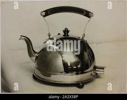 https://l450v.alamy.com/450v/2a2x38p/photograph-hecla-electrics-pty-ltd-auto-safety-nickel-plate-electric-kettle-south-yarra-1930s-black-and-white-photograph-of-a-nickel-plated-240-volt-ac-electric-kettle-with-removable-lid-and-enamel-handle-produced-by-hecla-electrics-pty-ltd-at-their-south-yarra-factory-in-melbourne-in-the-1930s-this-model-was-known-as-the-auto-safety-kettle-this-photograph-is-from-an-album-containing-255-black-and-white-photographs-depicting-electrical-appliances-showroom-displays-factory-2a2x38p.jpg
