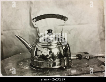 https://l450v.alamy.com/450v/2a2x38r/photograph-hecla-electrics-pty-ltd-auto-safety-nickel-plated-electric-kettle-south-yarra-1930s-black-and-white-photograph-of-a-nickel-plated-240-volt-ac-electric-kettle-with-removable-lid-and-enamel-handle-produced-by-hecla-electrics-pty-ltd-at-their-south-yarra-factory-in-melbourne-in-the-1930s-this-model-of-hecla-kettle-was-known-as-the-auto-safety-kettle-and-has-features-characteristic-of-art-deco-design-this-photograph-is-from-an-album-containing-255-black-and-white-2a2x38r.jpg