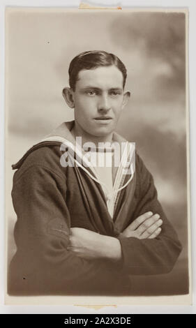 Photograph - HMAS Australia, Portrait of A Seaman, 1914-1918, One of 63 postcards contained in an album that was owned by Cliff Nowell. There are 25 postcards mounted inside the album and 38 postcard held loosely with in it, (loose postcards housed separately). The images depict photographs of sailors from HMAS Australia and of family and friends. It also conatins a mixture of hand-painted cards (two), original photographs Stock Photo