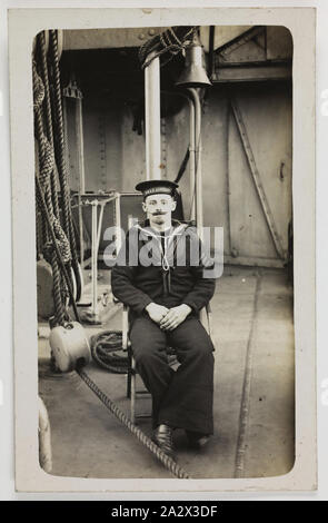 Photograph - HMAS Australia, Portrait of a Seaman, 1915, One of 63 postcards contained in an album that was owned by Cliff Nowell. There are 25 postcards mounted inside the album and 38 postcard held loosely with in it, (loose postcards housed separately). The images depict photographs of sailors from HMAS Australia and of family and friends. It also conatins a mixture of hand-painted cards (two), original photographs Stock Photo