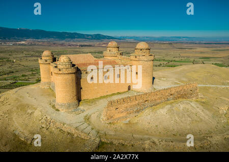 La Calahorra castle with Renaissance courtyard aerial panorama view near Almeria in Andalusia Spain, below the Sierra Nevada Stock Photo