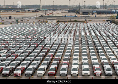 Laem Chabang, Thailand - March 16, 2019: Laem Chabang harbor. Lot with plus hundred brand new Dodge cars parked waiting for transport. Stock Photo