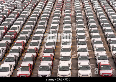 Laem Chabang, Thailand - March 16, 2019: Laem Chabang harbor. Closeup of part of Lot with plus hundred brand new Dodge cars parked waiting for transpo Stock Photo