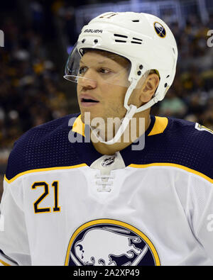Buffalo Sabres right wing Kyle Okposo (21) skates wearing a Hockey Fights Cancer  jersey prior to the first period of an NHL hockey game against the Seattle  Kraken, Monday, Nov. 29, 2021