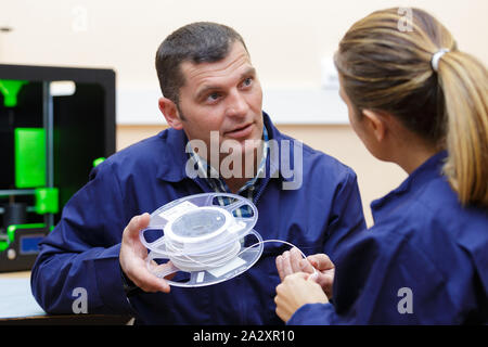 young engineer using 3d printer Stock Photo