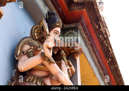 Hindu God Statue with carvings on it