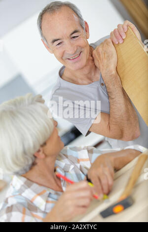 couple senior doing diy at home Stock Photo