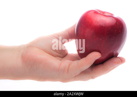 Female hand offeing a red Macintosh apple on white background Stock Photo