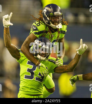 October 3, 2019: Seattle Seahawks safety Tedric Thompson (33) celebrates  his interception after an instant replay overruled the call on the field of  an incomplete pass during a game between the Los