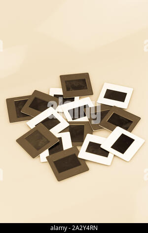 old slide projector film stack on white background Stock Photo