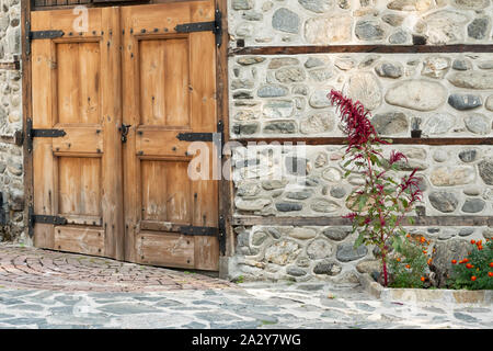 Part of entrance door of traditional Bulgarian house, historic exterior of Balkan construction Stock Photo