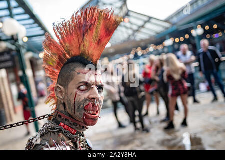 The extreme body-modified ‘Zombiepunk’ attends the 15th International London Tattoo Convention at Tobacco Dock, UK. Stock Photo