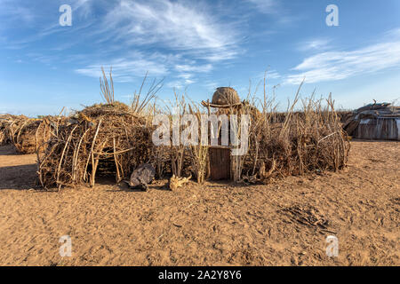 Poor huts in traditional african Dassanech village, Omo river, Ethiopia indigenous people houses Stock Photo