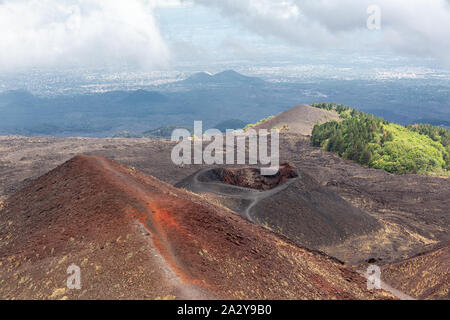 Mount Etna, or Etna, is an active stratovolcano on the east coast of Sicily, Italy, in the Metropolitan City of Catania, between the cities of Messina Stock Photo