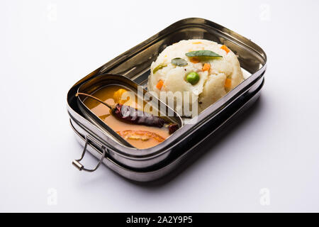 Upma / uppuma sambar in lunch box or tiffin Stock Photo