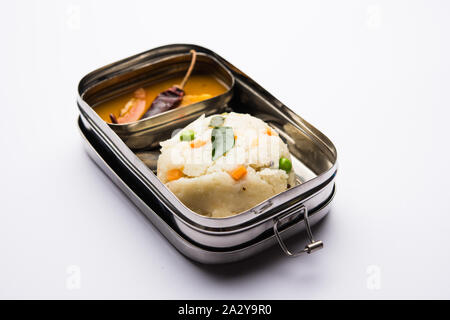 Upma / uppuma sambar in lunch box or tiffin Stock Photo