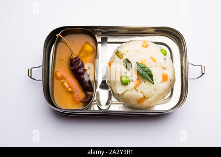 Upma / uppuma sambar in lunch box or tiffin Stock Photo