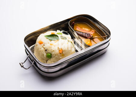 Upma / uppuma sambar in lunch box or tiffin Stock Photo