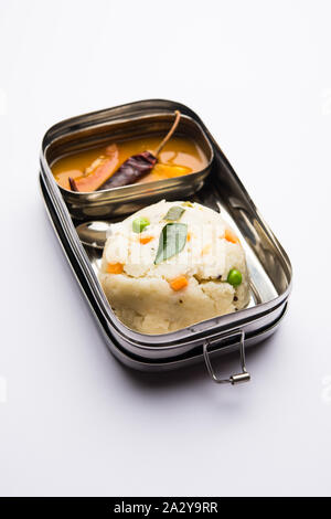 Upma / uppuma sambar in lunch box or tiffin Stock Photo